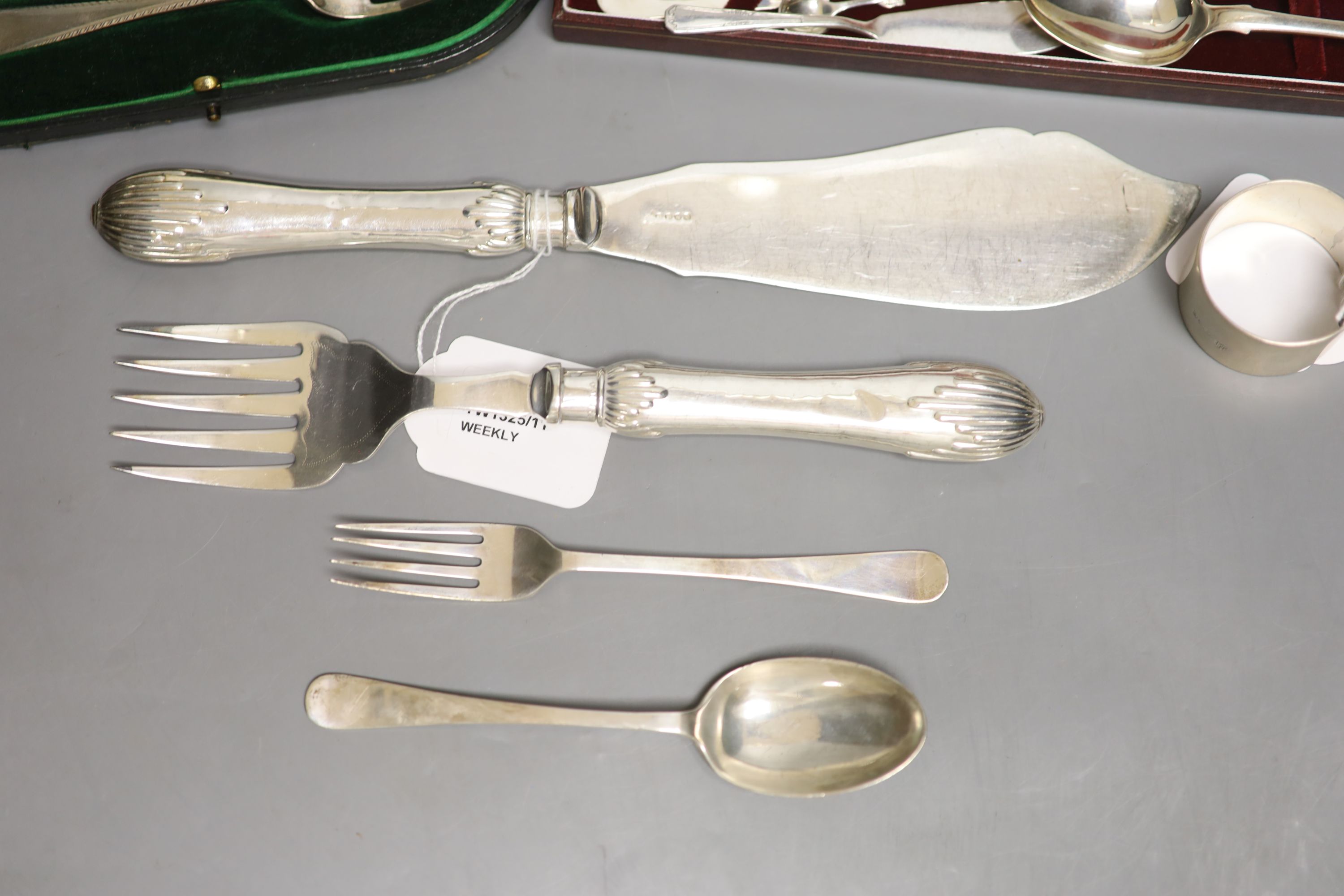 A small collection of silver and plated flatware,